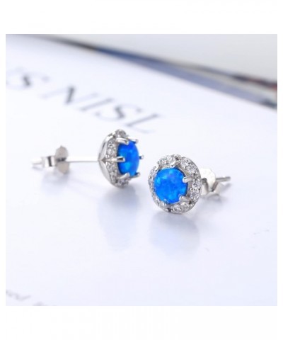 Gold Plated Sterling Silver Fire Opal Prong Setting Birthstone Stud Earrings White Gold Plated sterling silver & Blue Opal $8...